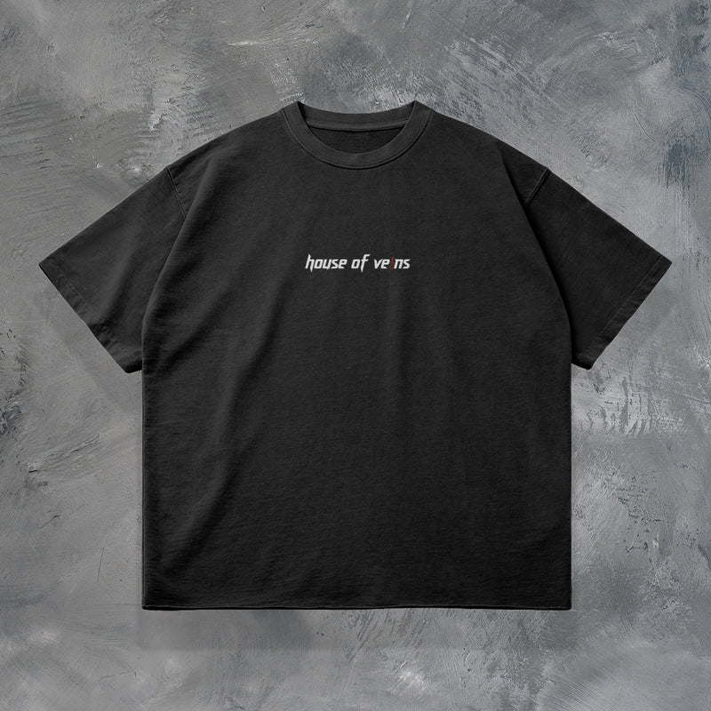 "GROWTH OUTWEIGHS DISCOMFORT" OVERSIZED T-SHIRT IN BLACK