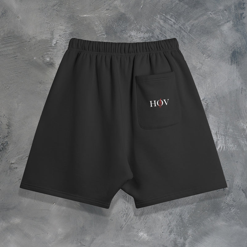 "NO DEFEAT" OVERSIZED SHORTS IN BLACK